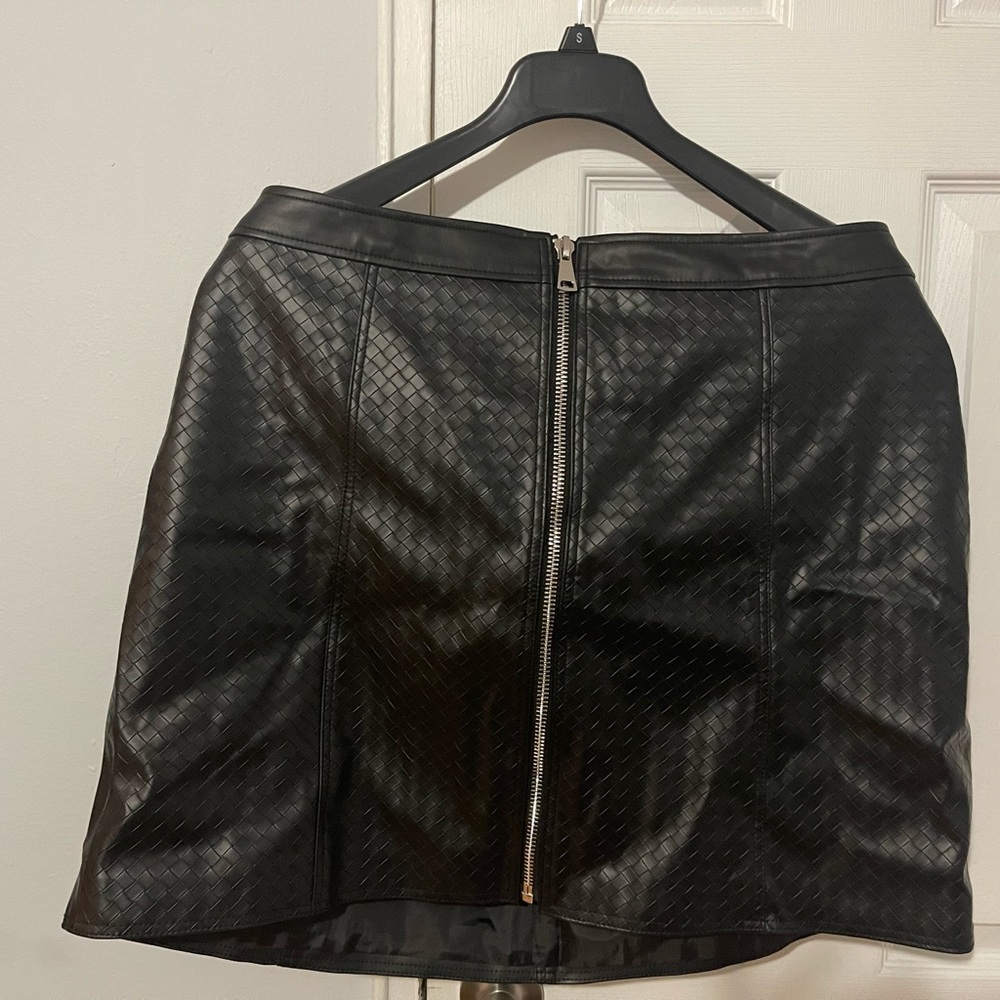 Leather mini skirt. Never worn.